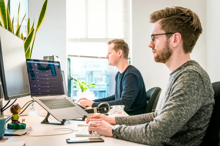 Microsoft Copilot or an AIOS layer: what works for SMBs